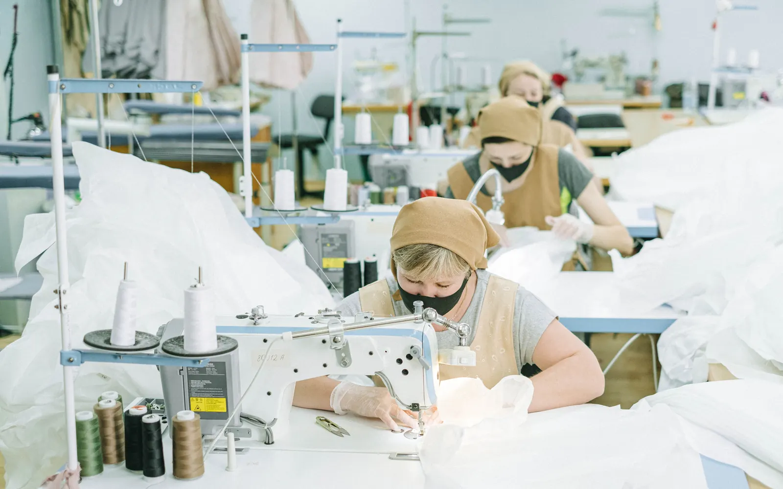 Apparel production at industrial sewing machines