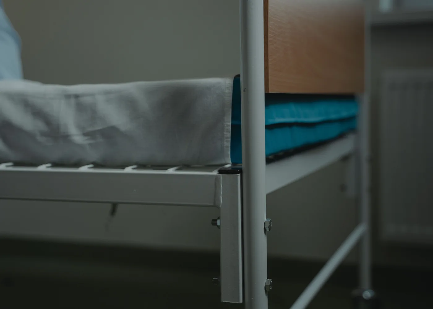 Hospital bed prepared with healthcare linen