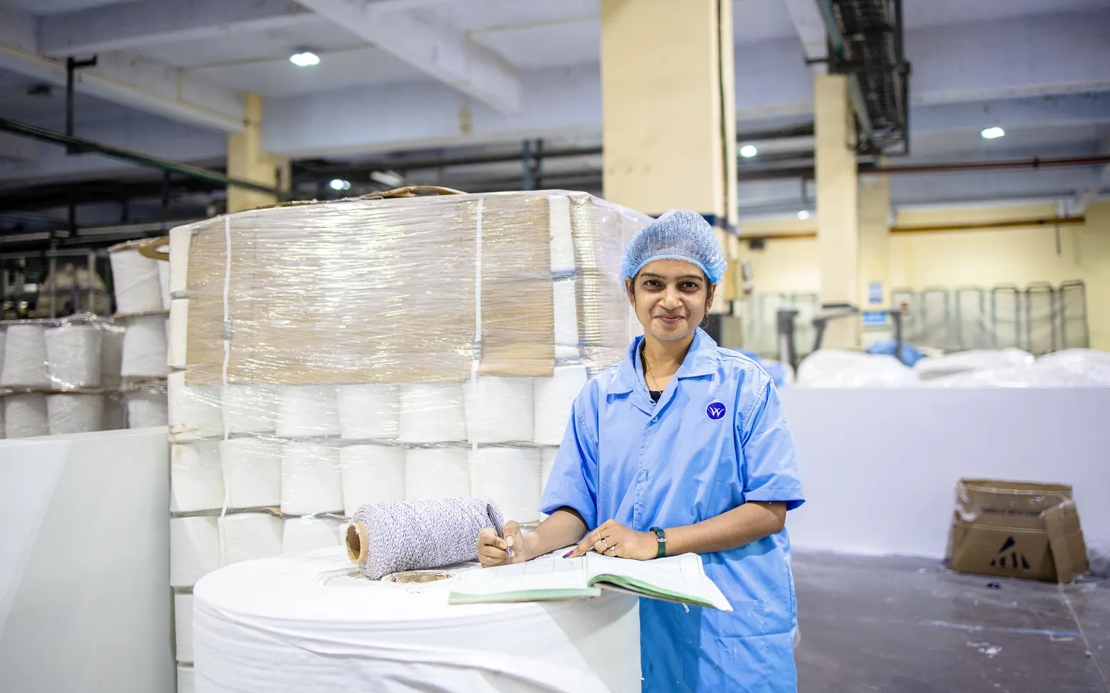 Textile sourcing and production professional in a yarn facility