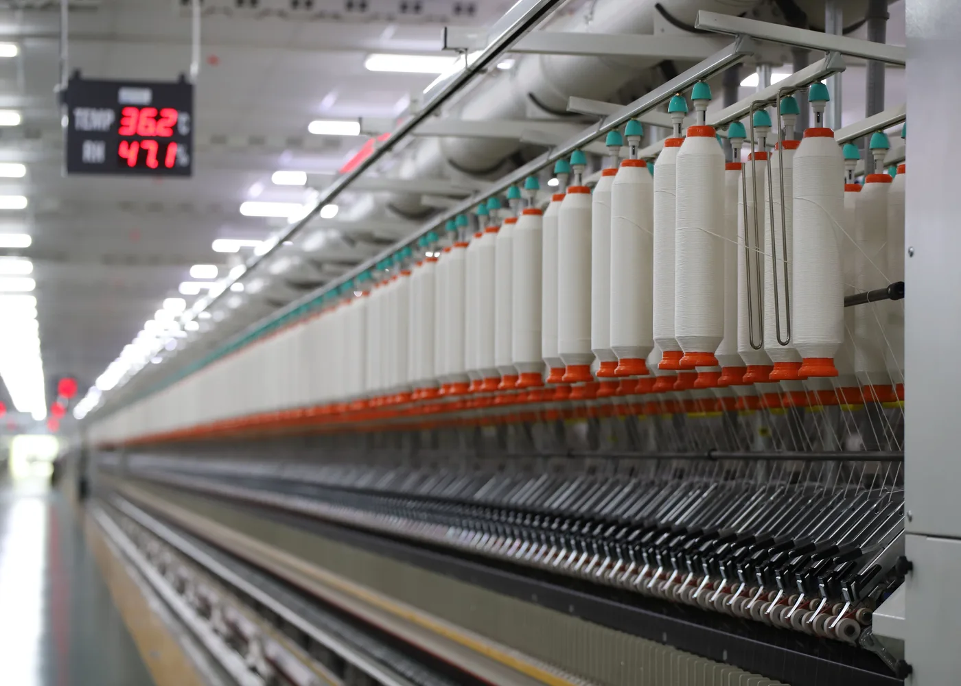 Yarn production machinery in a spinning facility