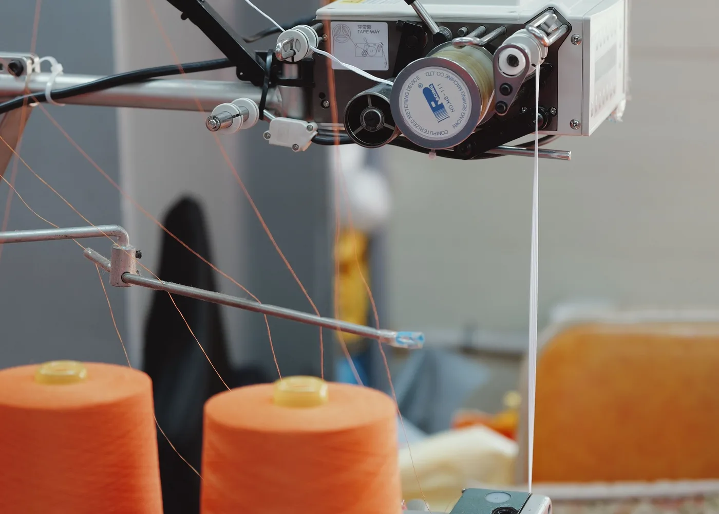 Thread processing on textile machinery